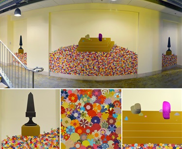 A mural on a yellow wall. 