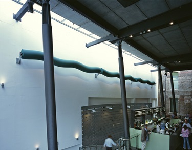 A sculpture on a wall. 