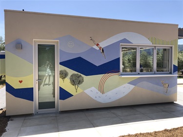 A mural painted on the wall of a building. 