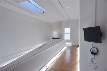 A white room. 