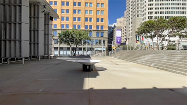 A small sculpture in an outdoor plaza. 