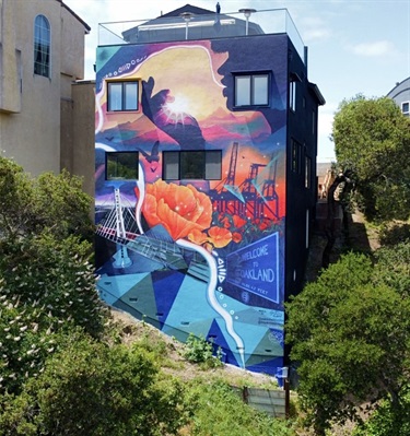 A painted mural on the side of a building. 