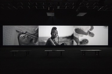 Projected photography in a dark room. 