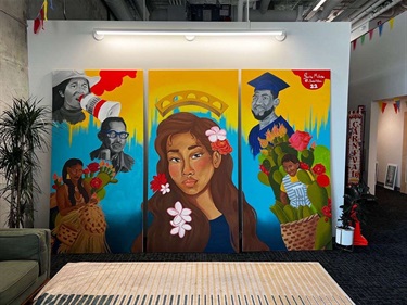 A large painting on three panels. 