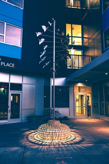 A sculpture in a building entryway.