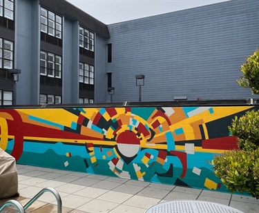 A colorful mural painted on a wall. 