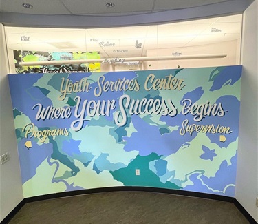 A colorful mural painted on a wall. 