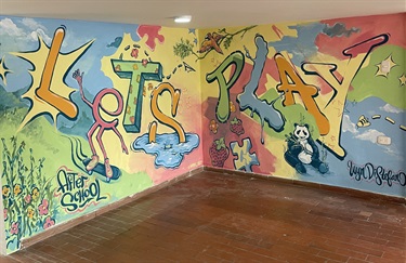 A colorful mural painted on a wall. 