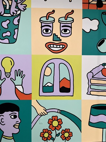 The detail of a painted mural on the surface of a wall. 