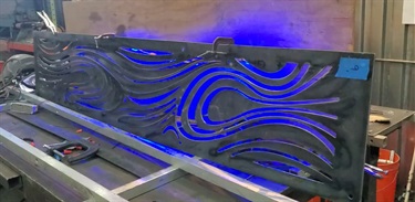 A metal sculpture in a workshop.