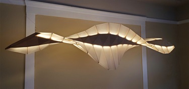 A suspended abstract sculpture.