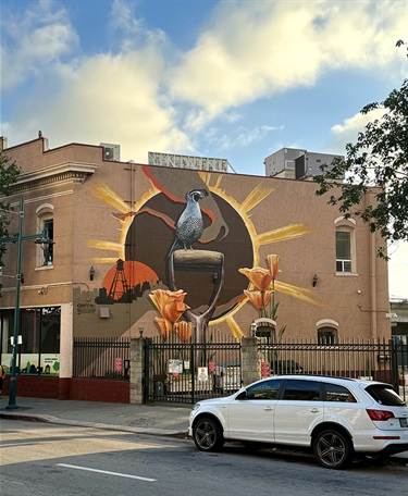 A mural on a building wall. 