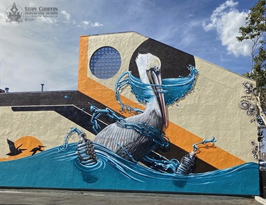 A mural on a building wall. 