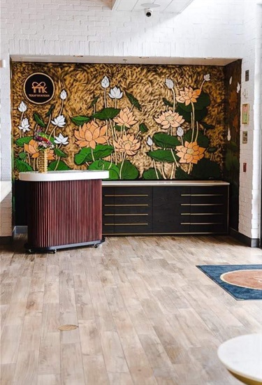 A painting on a wall inside a room. 