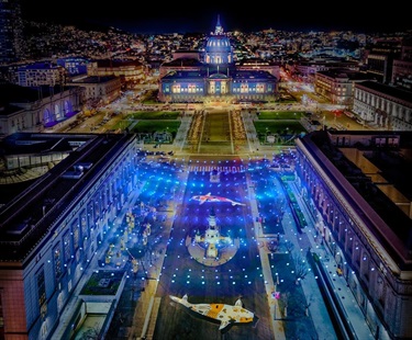 A city hall building at night.