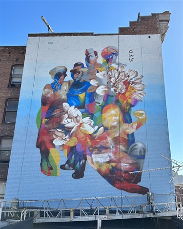 A mural on the side of a building. 