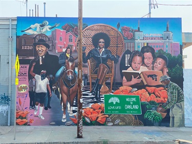 A mural painted on the side of a building. 