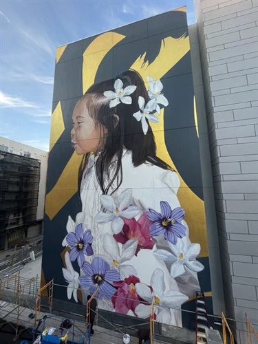 A mural painted on the side of a building. 