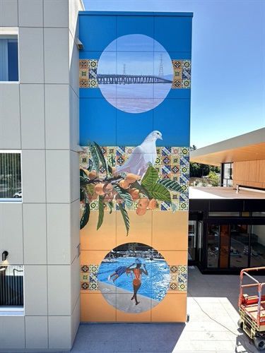 A mural painted on the side of a building. 