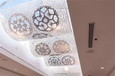 A piece of abstract artwork on a ceiling.