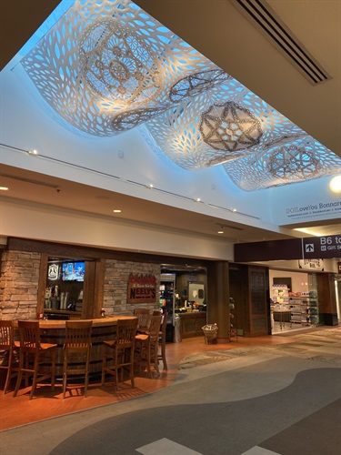 A piece of abstract artwork on a ceiling.