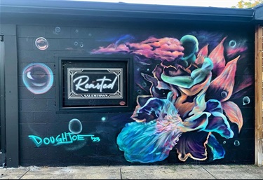 A mural painted on the wall of a building. 