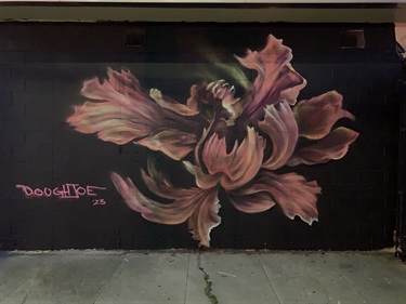 A mural painted on the wall of a building. 