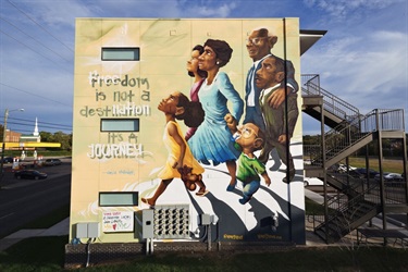 A mural painted on the wall of a building. 