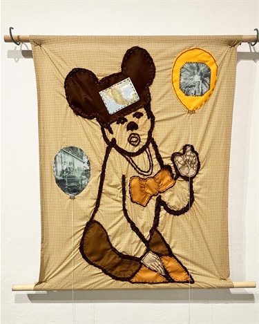 A piece of embroidered artwork. 