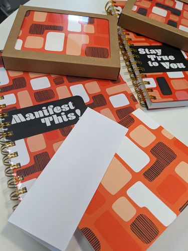 Artwork printed on notebook covers. 