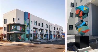 An abstract mural on the side of a building. 