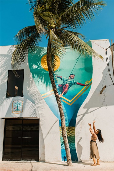 A mural painted on the side of a building. 