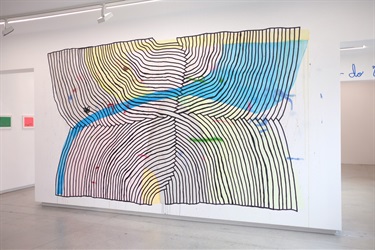 A large piece of artwork in a gallery. 