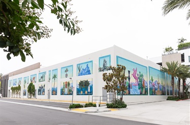 A mural painted on the side of a building. 