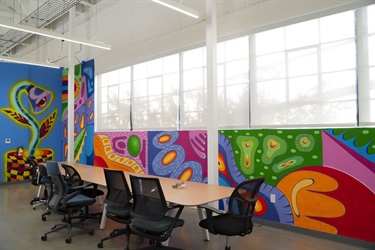 A mural painted on a wall in an office. 