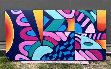 A mural painted on the side of a building. 