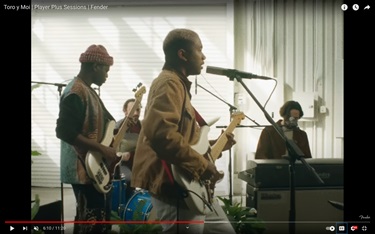 A screenshot from a youtube video of people playing music.