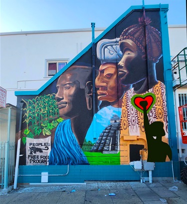 A mural painted on the side of a building. 