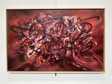 A red abstract painting. 