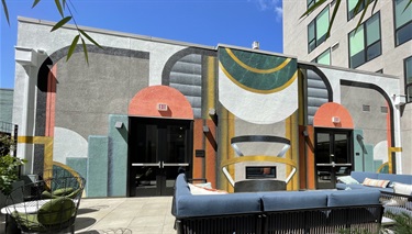 A mural painted on the side of a building. 