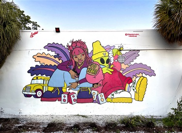 A mural painted on the side of a building. 