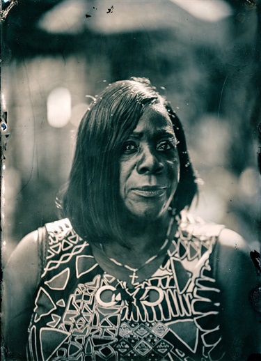 A portrait of a person smiling.