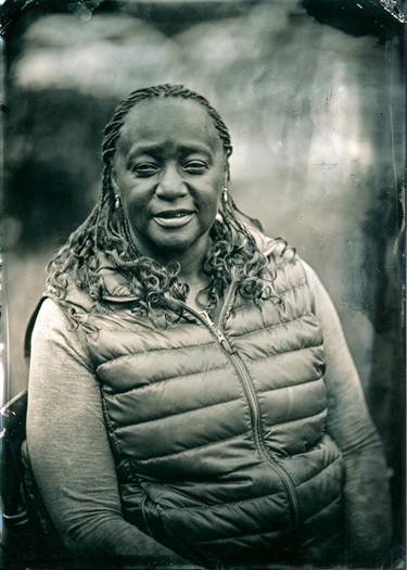 A portrait of a person smiling.