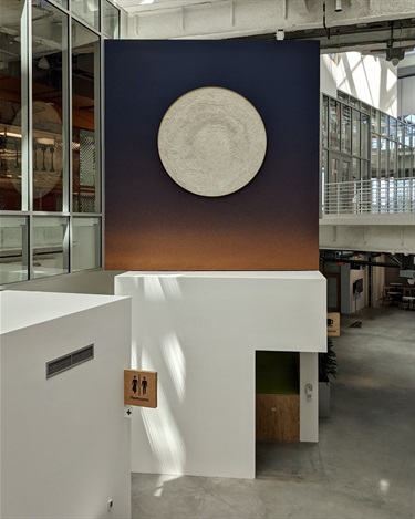 An abstract art piece in a room.