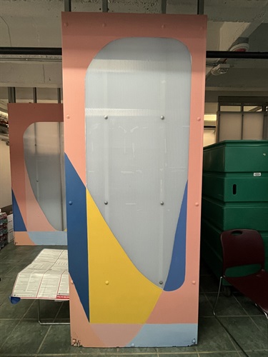 A mural painted on a storage unit cover. 