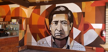 A mural painted on a wall inside a room. 