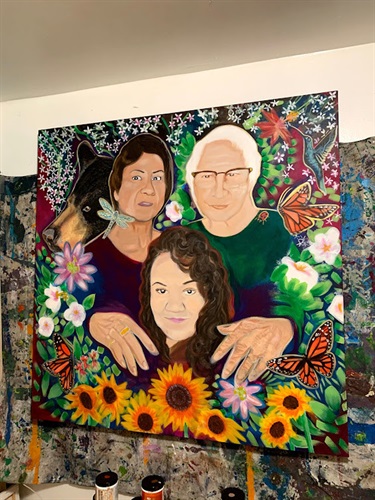 A painting of three people surrounded by flowers. 