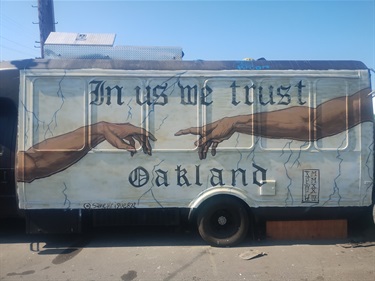 A mural painted on the side of a truck. 