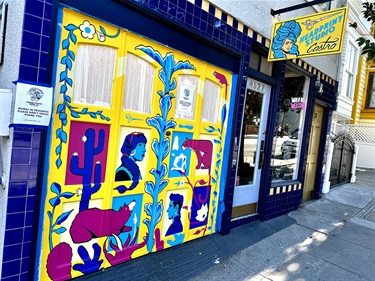 A mural painted on the wall of a building. 