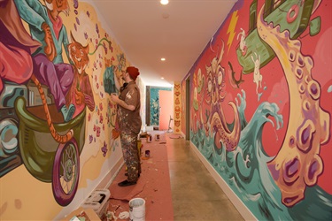 A mural painted on the wall of a building. 